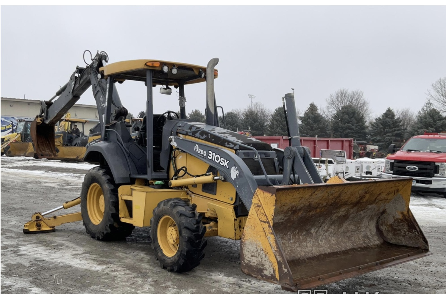Jhon deere 310 Backhoe Loaders transport quote to Laredo, TX. VeriTread